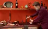 A man is filling a glass with water from a Quooker tap in a kitchen. Anteprima dell’immagine prodotto