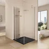 A modern bathroom featuring a sleek black shower tray and glass enclosure, with a large window overlooking a city skyline and a freestanding bathtub in the background. Anteprima dell’immagine prodotto