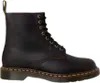 A single brown Dr. Martens boot is shown against a white background. Voir les images du produit