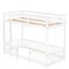 A white wooden bunk bed with a ladder and safety rails. Voir les images du produit