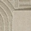 A close-up view of a textured rug, showing the weave and backing. Podgląd zdjęcia produktu