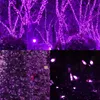 A collage of images showing purple LED lights on trees, a Christmas tree, and close-ups of the lights. Produktbild-Vorschau