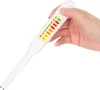 A hand holds a white digital salt meter with a color-coded LED display. Náhled obrázku produktu