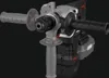 A cordless rotary hammer drill with multiple handle attachments shown against a black background. Produktbild-Vorschau