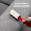 A hand is using a Vileda lint roller on a gray fabric surface, likely a sofa, to remove pet hair. Text overlays indicate the product's effectiveness. Produktbild-Vorschau