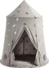 A grey play tent with gold planet and rocket patterns, featuring an open entrance and two circular mesh windows. Podgląd zdjęcia produktu