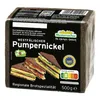 A loaf of Pumpernickel bread is shown, packaged, with a label and nutritional information. Náhľad obrázku produktu
