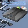 An external optical drive and various cables are laid out on a blue surface, with a laptop in the background. Produktbild-Vorschau