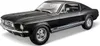 A black 1967 Ford Mustang Fastback model car is shown from a three-quarter front angle against a white background. Podgląd zdjęcia produktu