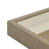 A close-up view of the corner of a wooden picture frame with a beige mat. Produktbild-Vorschau