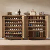 Two wooden shoe cabinets filled with shoes and boots, placed against a textured wall. Anteprima dell’immagine prodotto