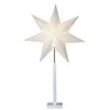 A white, eight-pointed star-shaped lamp on a white stand. Podgląd zdjęcia produktu