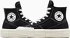 A pair of black Converse Chuck Taylor All Star Cruise high-top sneakers with white laces and soles, shown from a side angle against a white background. Produktbild-Vorschau