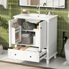 A white bathroom vanity with its doors and drawer open, revealing storage shelves with towels, toiletries, and a basket. The vanity is set against a green tiled wall with a mirror above it. Anteprima dell’immagine prodotto