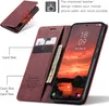 A red leather phone case with card and cash slots, open to reveal a phone screen displaying a sunset. Produktbild-Vorschau