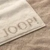 A close-up view of a towel with the brand name embroidered on it. Anteprima dell’immagine prodotto