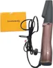 A rose-colored hot air brush with its cord and an instruction manual. Podgląd zdjęcia produktu