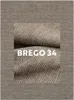 A close-up of fabric with text overlay. Voir les images du produit