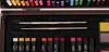 A close-up view of an art supply set, showing brushes, oil pastels, and paint pans. Náhľad obrázku produktu