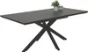 A dining table with a dark gray tabletop and black criss-cross legs is shown against a white background. Two decorative items, a potted plant and a small jar, are placed on the tabletop. Náhled obrázku produktu