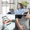 A collage of images showing a tablet being used and carried. Voir les images du produit