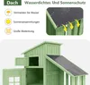 A close-up view of a green wooden garden shed with a black roof, highlighting its features. Náhled obrázku produktu
