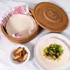 A tortilla basket with a checkered towel and tortillas, next to a plate with a prepared tortilla and a small bowl of sliced chicken. Anteprima dell’immagine prodotto