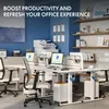 A modern office with adjustable desks, computers, printers, and organizational shelves. Podgląd zdjęcia produktu