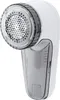 A white fabric shaver with a transparent collection bin. Náhled obrázku produktu