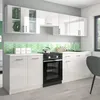 A modern, high-gloss white kitchen unit with a black oven and a green hexagonal backsplash. Náhled obrázku produktu