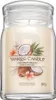 A Yankee Candle Coconut Beach scented candle in a glass jar with a lid. Anteprima dell’immagine prodotto