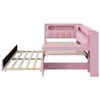 A pink daybed with an extended pull-out trundle bed, shown from a side angle against a white background. Náhľad obrázku produktu