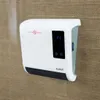 A white Eurom Sani Fanheat 2000R bathroom heater mounted on a textured wall. Náhled obrázku produktu
