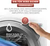Close-up of a washing machine door with a hand pointing to a lock icon, indicating a safety feature. Produktbild-Vorschau