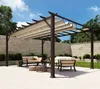 An outdoor patio with a pergola, seating, and a coffee table. Podgląd zdjęcia produktu