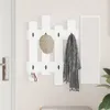 A white wall-mounted coat rack with a hat and scarf hanging on it. Náhľad obrázku produktu