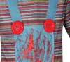 Close-up of a child's costume, showing denim overalls with large red buttons and red splatters, worn over a striped shirt. Anteprima dell’immagine prodotto