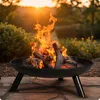 A fire pit with burning logs in an outdoor setting at sunset. Náhľad obrázku produktu