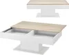 A white coffee table with a wood-effect top, shown in two views: one closed and one with drawers open. Náhled obrázku produktu