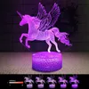 A 3D illuminated unicorn lamp with a textured base, displayed in a dimly lit room with a brick-like wall in the background. Below the main product, there are smaller images of the same unicorn lamp, suggesting different color options or modes. Produktbild-Vorschau