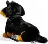 A plush toy dog sitting on a white background. Produktbild-Vorschau