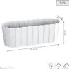 A white planter box with dimensions indicated. Voir les images du produit