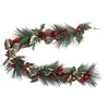 A Christmas garland with pine needles, pine cones, red berries, and frosted holly leaves. Podgląd zdjęcia produktu