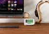 A desk setup with a laptop, a stream deck, and headphones. Náhled obrázku produktu