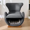 A gray armchair with a built-in pet bed is shown in a well-lit room with wooden flooring and soft shadows. Náhled obrázku produktu