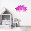 A child's bedroom with a bed, a lamp, and decorative items. Anteprima dell’immagine prodotto