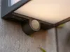 Close-up of a motion sensor on a wall-mounted LED light. Anteprima dell’immagine prodotto