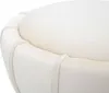 A close-up shot of a round, cushioned stool or ottoman. Produktbild-Vorschau