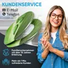 A woman is smiling and clapping her hands next to a green leaf-shaped toilet seat. The background shows a bathroom setting. Text overlays provide customer service information and company details. Produktbild-Vorschau