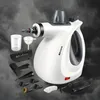A white steam cleaner and its accessories are displayed against a smoky gray background. Produktbild-Vorschau